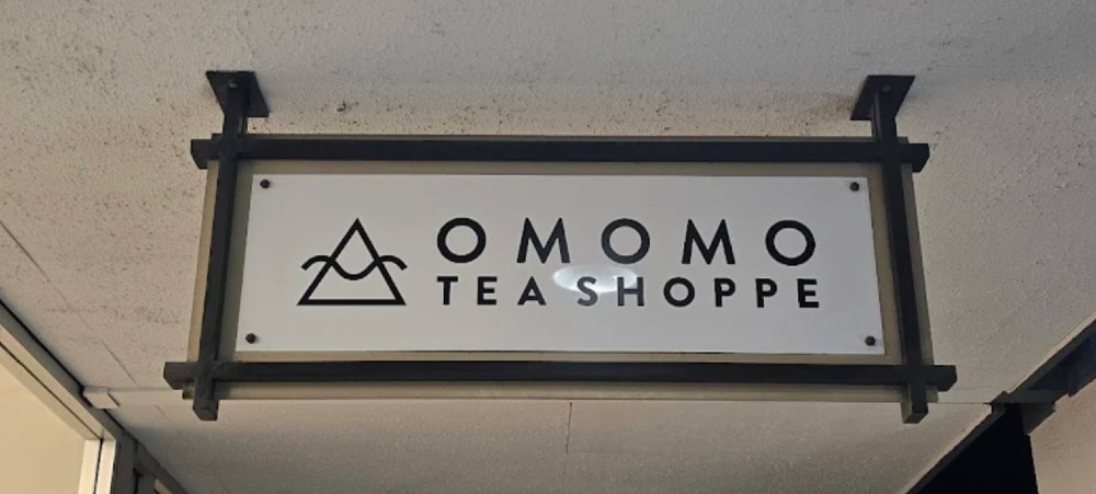 Omomo Tustin hanging exterior sign